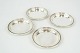 Set of 4 
allmarked 
silver trays 
with nice pearl 
edge. 
Total 
diameter: 9cm
5000m2 
showroom