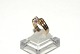 Elegant lady 
ring with red 
stones and 
diamonds in 14 
carat gold
Stamped 585
Str 56
The check ...