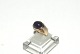 Elegant lady 
ring with 
purple stone in 
8 carat gold
Stamped GIFA 
GIFA
Str 52
The check by 
the ...