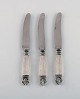 Three Georg 
Jensen Acanthus 
fruit knives in 
sterling silver 
and stainless 
steel.
Length: 17.2 
...