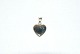 Elegant heart 
pendant in 8 
carat gold
Stamp 333
Height 23.31 
mm
Thickness 3.80 
mm
The check ...
