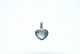 Elegant heart 
pendant in 8 
carat white 
gold
Stamp 333
Height 23.31 
mm
Thickness 3.80 
mm
The ...