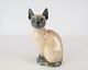 Royal porcelain 
figure, Siamese 
cat, no.: 3281 
by Royal 
Copenhagen.
Dimensions: 14 
x 10 x 5 cm.
