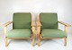 A pair of 
armchairs, 
model GE290, 
designed by 
Hans J. Wegner 
and 
manufactured by 
Getama in the 
...