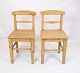 A pair of 
antique chairs 
of pine wood, 
in great 
condition from 
the 1850s. The 
chairs will be 
...