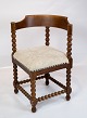 Antique chair 
with carvings 
of oak  and 
upholstered 
with light 
fabric from the 
1920s. The 
chair ...