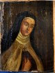 Unknown artist, 
19th century: A 
nun. Unsigned. 
Oil on canvas. 
12 x 9 cm.
Framed in a 
gilded ...