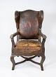 Antique 
armchair with 
original dark 
brown leather, 
in vintage 
condition from 
1790. 
H - 111 cm, 
...