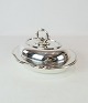 Lidded dish of 
hallmarked 
silver.
H - 15 cm, W - 
30 cm and D - 
24 cm.