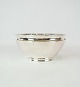 Bowl of 
hallmarked 
silver stamped 
Aug. Thomsen. 
H - 9 cm and 
Dia - 19 cm.