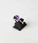 Ring decorated 
with amethyst 
and of 14 carat 
gold, stamped 
HJ.
Size - 51