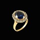 18k Gold 
Cocktail Ring 
with Synthetic 
Sapphire and 21 
Diamonds total 
0.63 ct.
Stamped with 
...
