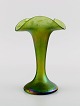 Pallme-König 
art nouveau 
vase in green 
mouth-blown art 
glass. Approx. 
1900.
Measures: 18 x 
12 ...