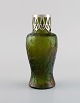 Pallme-König 
art nouveau 
vase in green 
mouth-blown art 
glass with 
silver 
mounting. 
Approx. ...
