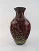 Large Murano 
vase in mouth 
blown art 
glass. 1960s.
Measures: 37 x 
21 cm.
In good 
condition.