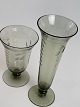 Pair of art 
deco glass 
vases with 
decoration of 
leaf vines in 
the color 
smoke-topaz 
with green ...