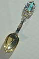 A. Michelsen 
Christmas 
cutlery, gilded 
sterlingsilver 
with an enamel 
motif. 
Christmas spoon 
from ...