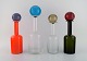 Otto Brauer for 
Holmegaard. 
Four large 
vases / bottles 
in mouth-blown 
art glass with 
balls. ...