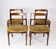 A set of dining 
room chairs in 
rosewood and 
green fabric, 
by Danish 
design from the 
1960s, ...