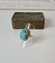 Egyptian Art 
Deco gold ring 
in 12 kt 
adorned with 
scarab cut in 
turquoise 
Stamped with 
...