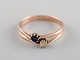 Scandinavian 
jeweler. Ring 
in 14 carat 
gold adorned 
with blue and 
clear 
semi-precious 
stones. ...