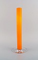 Anne Nilsson 
for Orrefors. 
Vase in clear 
and orange 
mouth-blown art 
glass. 1980s.
Measures: ...