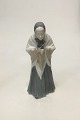 Royal 
Copenhagen 
Figurine of 
Church Goer No 
892.
Measures 21 cm 
/ 7.28 in.