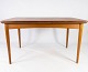 Dining table in 
teak with 
extentions and 
legs in oak, of 
danish design 
from the 1960s. 
The table ...