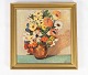 Oil painting 
with floral 
motif and 
gilded frame, 
signed A.T. 
from 1946. 
43.5 x 43 x 3 
cm.