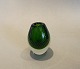 Vase in clear 
glass with 
green base and 
bubbles
Holmegård or 
finsk glasværk
H: 11,5 cm
Good ...