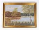 Oil painting 
with nature 
motif and 
gilded frame, 
without 
signature from 
the 1930s. 
54 x 73 x 3 
cm.