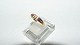 Elegant ladies 
ring with 
Brilliant and 
red stones in 
18 carat gold
Stamped 750
Str 62
The ...