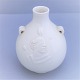 Jais Nielsen 
for Royal 
Copenhagen; A 
porcelain vase 
#20569. 
Decorated in a 
white colour. 
H. ...