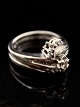 10 carat white 
gold ring size 
52 with large 
zircon and 
numerous small 
diamonds item 
no. 462115