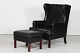 Danish Modern
Wingback chair 
Kaare in Klint 
style with 
stool.
Upholstered 
with black 
leather ...