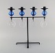 Erik Höglund 
for Kosta Boda, 
large candle 
holder in cast 
iron with mouth 
blown glass. 
Mid 20th ...