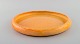 Svend 
Hammershøi for 
Kähler, HAK. 
Large round 
dish in glazed 
stoneware. 
Beautiful 
yellow uranium 
...