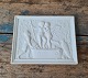 Bing & Grøndahl 
Bisquit "Cupid 
and the young 
Bacchus stomp 
grapes" Copy of 
relief modeled 
in ...