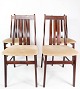 Set of four 
dining room 
chairs of 
mahogany and 
upholstered 
with light 
fabric, of 
Danish design 
...