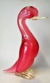 Murano duck, 
light red and 
clear glass, 
20th century 
Italy. H.:30 
cm.