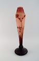 Daum Nancy, 
France. Large 
"Tobacco 
flowers" 
multilayer 
glass vase with 
an etched decor 
of red ...