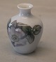 173-395 RC Vase 
with fruit 
flower 8.5 cm 
Royal 
Copenhagen In 
mint and nice 
condition