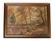 Painting on 
canvas with 
forrest motif 
and with dark 
wooden frame, 
signed V. 
Jespersen from 
the ...