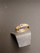 8. carat gold 
ring with red 
stone Size 52