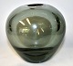 Holmegård round 
glass vase, 
1957, Denmark. 
Smoky glass. 
Signed. H .: 12 
cm. Dia: 13 cm. 
Design: ...