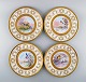 Camille Tharand 
for Limoges. 
Four decorative 
plates in 
porcelain with 
gold leaf and 
hand-painted 
...