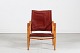 Kaare Klint 
(1888-1954)
Safari chair 
made of ash 
wood with core 
leather
and cushions 
of ...