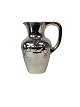 Water jug in 
the style of 
Art Nouveau of 
hallmarked 
silver stamped 
Augusta H., 
from the 1930s. 
...