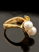 18 carat gold 
ring size 57 
with 2 genuine 
pearls stamped 
750 GJ & W for 
Georg Jensen & 
Wendtler ...