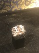 White gold 
ring. Diamonds 
5 x 0.01 ct. 
Gold 14 k. Ring 
size: 60